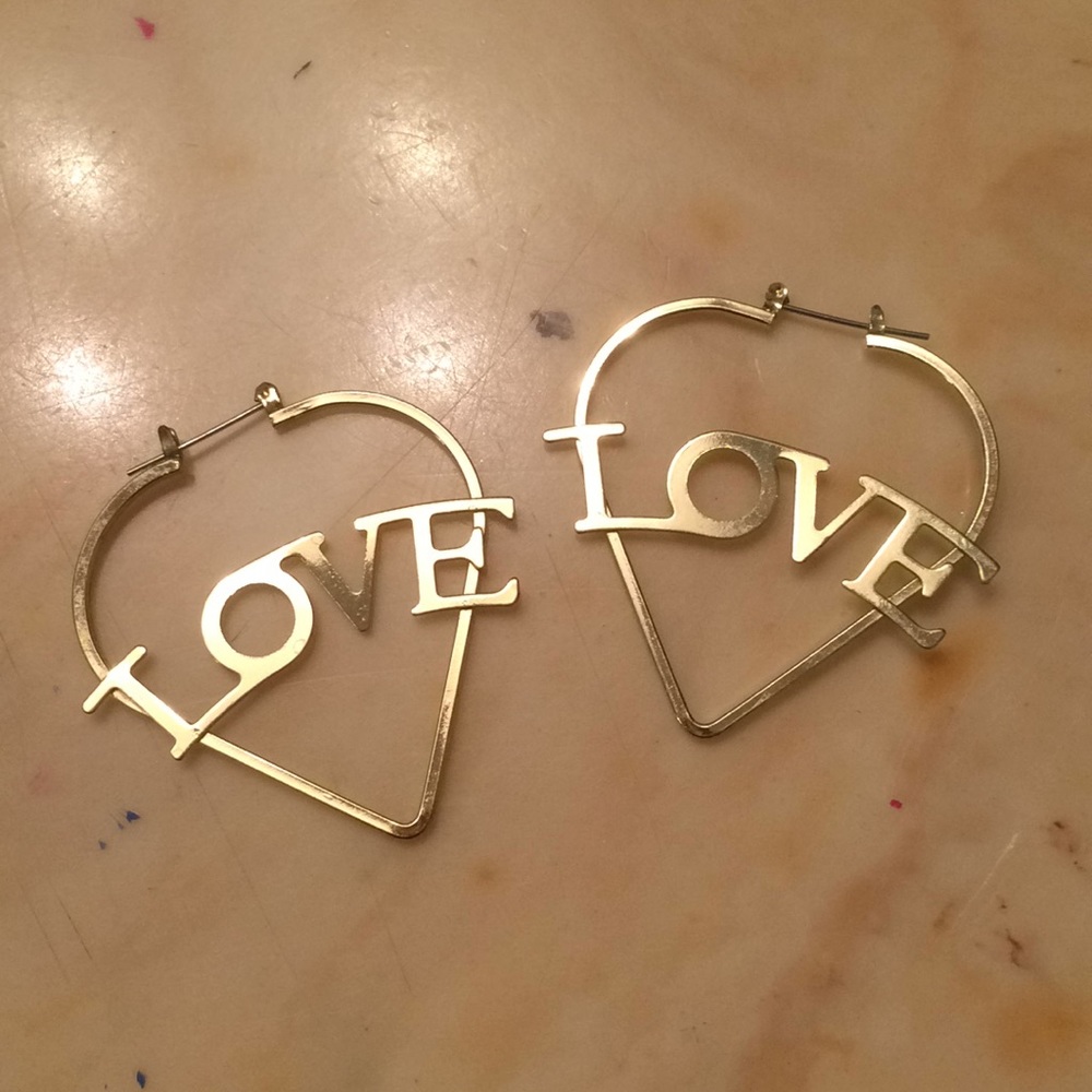 Gold plated LOVE script earrings